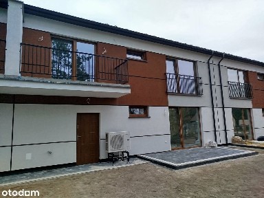 Nowe domy w zabudowie szeregowej z garażem
