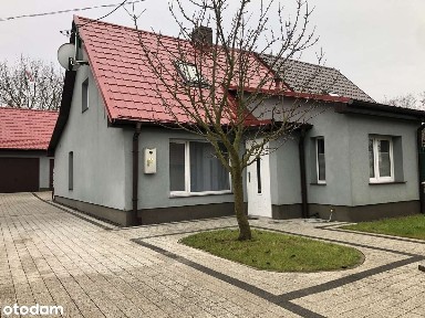 Dom na sprzedaż z ogrodem i garażem