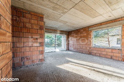 Parterowy Dom z Dwustanowiskowym Garażem w Bryle
