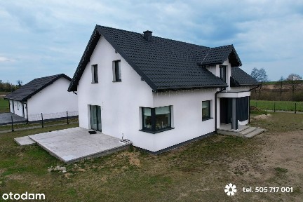 Nowoczesny dom niedaleko jeziora, przestronna działka z garażem