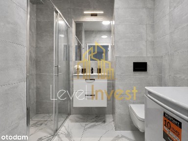 Apartament z sypialnią, strefą dzienną i prywatnym ogródkiem