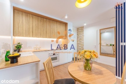 Wyposażony apartament z ogródkiem blisko plaży