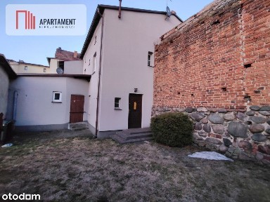 Dom z podwórkiem i garażem w centrum Nml