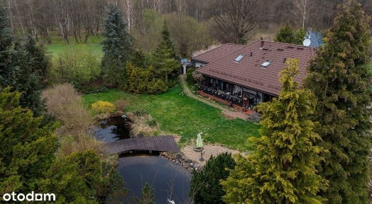 Dom blisko lasu z zadbaną i dużą działką