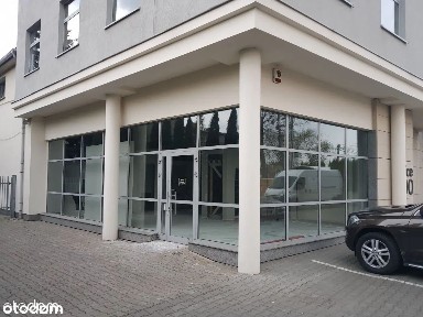 Biurowiec wielofunkcyjny, sklep z halą i parkingiem