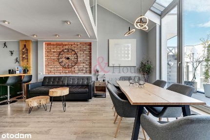 Dwupoziomowy apartament w inwestycji z basenem