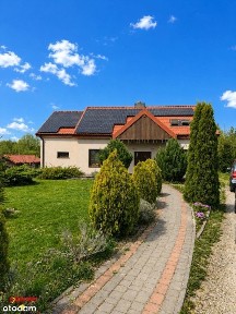 Dom z własnym stawem i dużą działką, fotowoltaika, klimatyzacja.