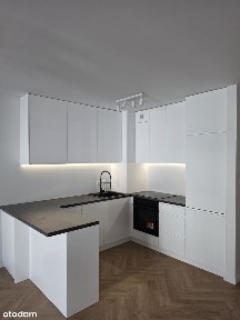 Przestronne mieszkanie z balkonem i garażem w Apartamentowcu