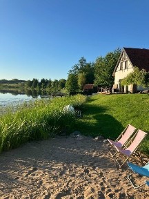 Siedlisko dom linia brzegowa Mazury pomost sauna