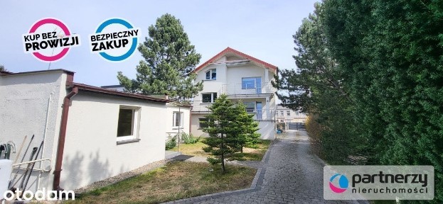 Dom podzielony na 2 mieszkania oraz dom w ogrodzie