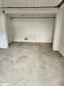 Garaż w bryle budynku przy Zygmunta Starego