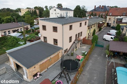 Dom • 3 mieszkania • lokal usługowo - handlowy • garaż