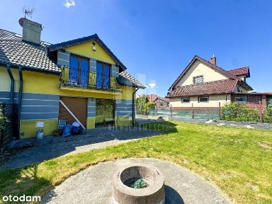 Komfortowy dom bliźniaczy z garażem i ogrodem