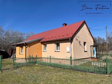 Dom drewniany w Osobnicy gm. Jasło gospodarstwo rolno-leśne 1,9688 ha