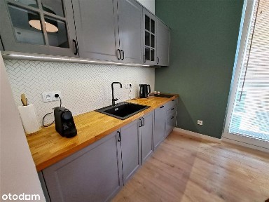 Dwupokojowy apartament z tarasem, wysoki standard.