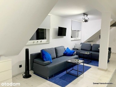 Apartament z ogrodem i 2 miejscami parkingowym w topowej dzielnicy
