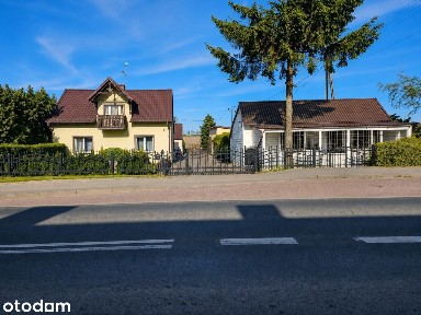 DOM Z FOTOWOLTAIKĄ Z BUDYNKIEM USŁUGOWYM, GARAŻAMI I GRUNTEM