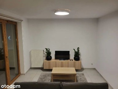 Kawalerka z balkonem i miejscem postojowym