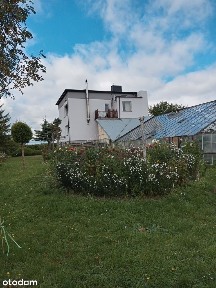 Wolnostojący dom z garażem i ogrodem