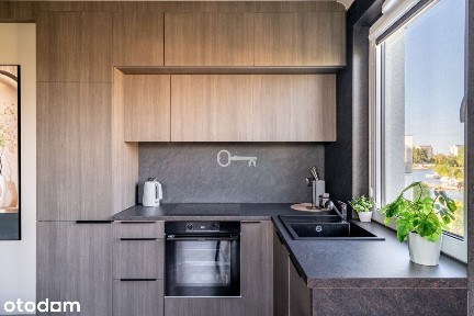 Apartament z klimatyzacją i widokiem na rzekę