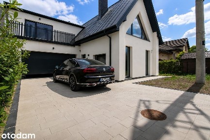 Salon 7 m wysokości | 225 m² | Garaż 2 miejsca |