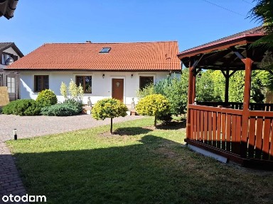 Uroczy dom nad jeziorem z Domkiem Sternika 40 m2