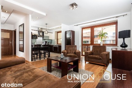 Zadbany apartament z dużym balkonem i garażem