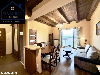 Apartament nad jeziorem z miejscem postojowym