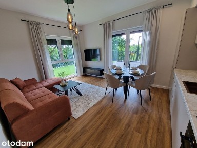 Nowy apartament z tarasem i ogrodem