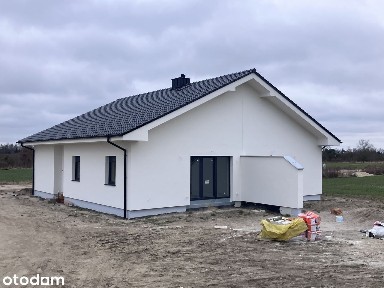 Bezpośrednio Dom bliźniaczy parterowy z dużą działką wyszpachlowany.