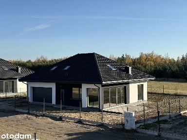 Dom wolnostojący/podwójny garaż/działki 865m2+/poddasze 75m2/Bez PCC