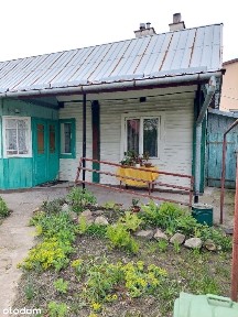 Dom wolnostojący z użytkowym strychem i garażem