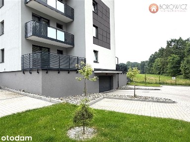 Kawalerka z dużym tarasem, komórką i m. parking