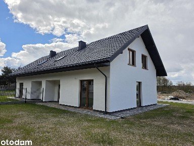 Nowy dom w zabudowie bliźniaczej z garażem i widokiem na Łomżę i Narew