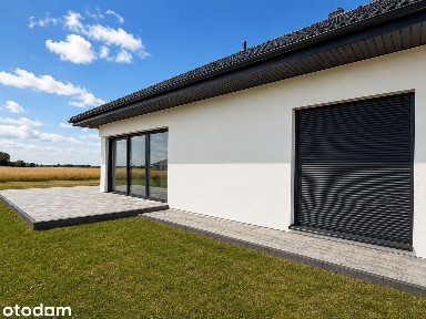 Nowoczesny dom parterowy 185 m² z ogrodem zimowym i działką 1300 m²