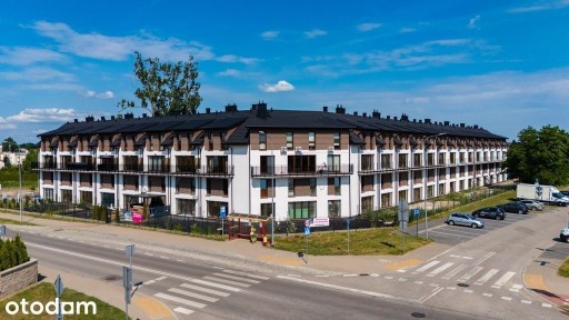 Dwupoziomowe mieszkanie z ogródkiem, Modrzewiowa