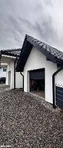 Nowoczesny dom 325 m² z użytkowym poddaszem i dwoma garażami