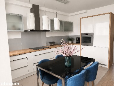 Komfortowe 70 m² przy Jeziorze Malta-3 pokoje, 2 balkony, garaż, basen
