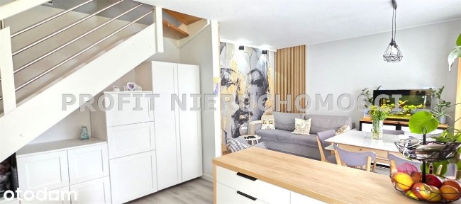 Nowoczesny apartament dwupoziomowy z ogródkiem