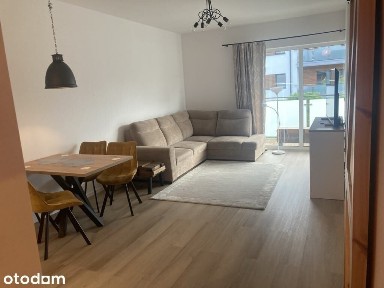 2 pokojowy apartament z tarasem, miejsce w hali garażowej