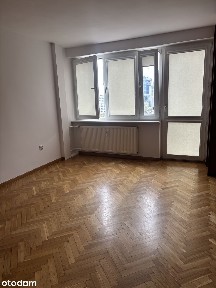 Najem lokalu mieszkalnego przy al. Jana Pawła II 18 w Warszawie.