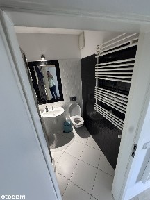 Klimatyczne studio z sypialnią w centrum w prestiżowym apartamentowcu