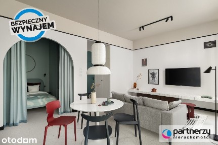 Designerskie mieszkanie z ogrókiem i halą garażową