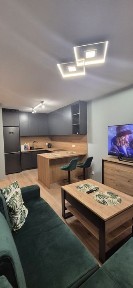 Do wynajęcia Nowe klimatyzowane mieszkanie z garażem, windą,komórką lokatorską