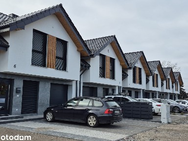 Kępa - Nowoczesny dom jednorodzinny w zabudowie szeregowej 141 m²