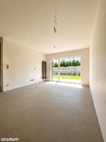 Apartament z ogrodem i 2 miejscami parkingowymi