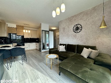 Apartament z miejscem parkingowy oraz pomieszczeniem gospodarczym