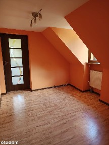 Mieszkanie w szeregowcu z ogródkiem i garażem
