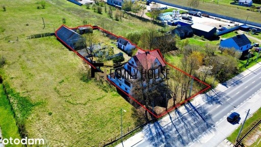 Chęciny. Dom i budynki gospodarcze pod działalność