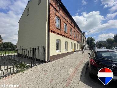 Kamienica w Chełmży nad brzegiem jeziora